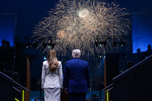 President Donald Trump and first lady Melania Trump watch fireworks following a parade to honor the Army's 250th anniversary, coinciding with Trump's 79th birthday, Saturday, June 14, 2025, in Washington. (Doug Mills/The New York Times via AP, Pool)
