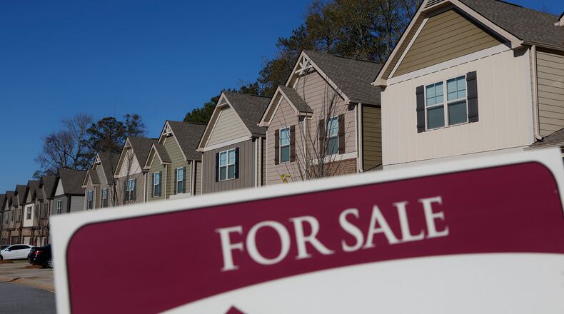 A home is advertised for sale in McDonough. (Natrice Miller/natrice.miller@ajc.com)