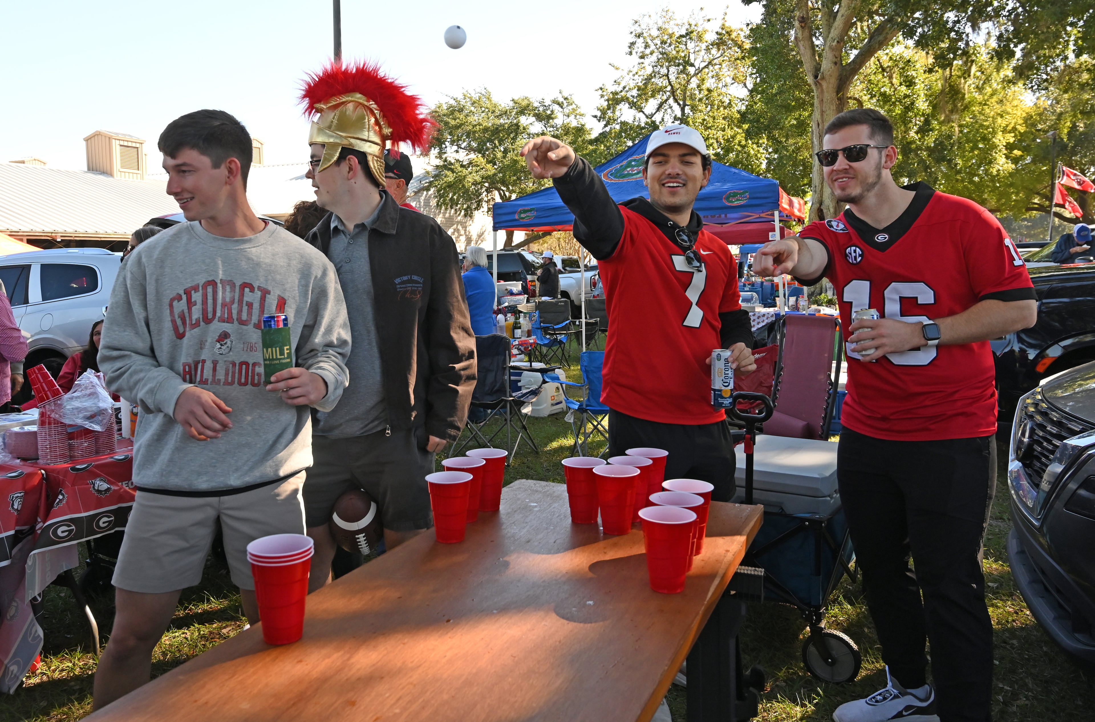 Georgia fans enjoy tailgating outside EverBank Stadium prior to an NCAA football game between Georgia and Florida, Saturday, Nov. 1, 2025, Jacksonville, Fla. (Hyosub Shin / AJC)