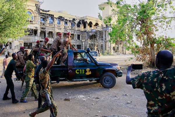 Sudan's Amy troops deploy for the arrival of military chief Gen. Abdel-Fattah Burhan at the Republican Palace, recently recaptured from the Rapid Support Forces paramilitary group, in Khartoum, Sudan, Wednesday, March 26, 2025. (AP Photo)