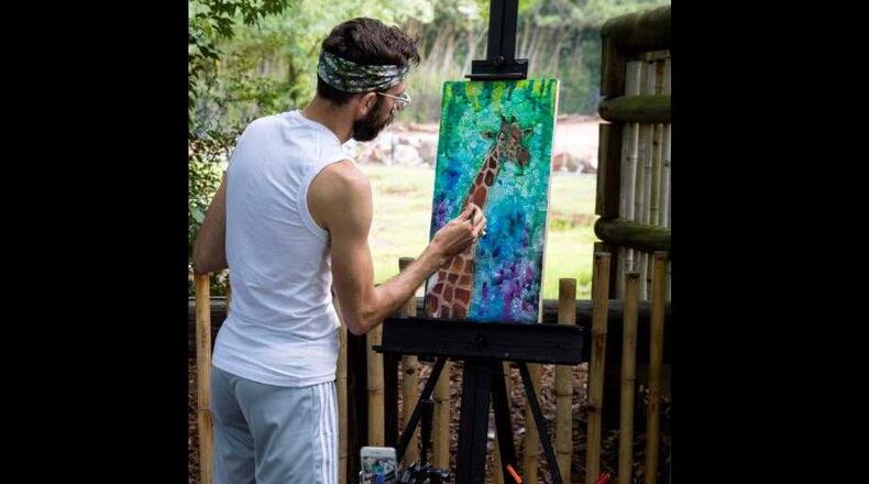 Artist Micah Goguen is one of 30 artists involved in Zoo Atlanta's Art Gone Wild sale.