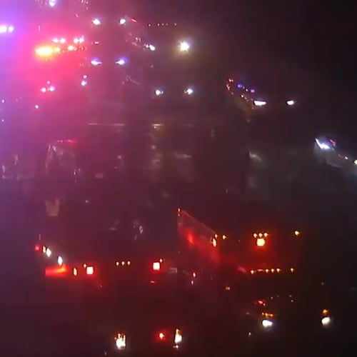 A crash investigation blocks I-285 East at Buford Highway in DeKalb County early Thursday. (Channel 2 Action News)