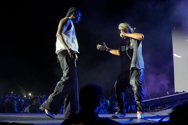 Young Thug, left, performs with special guest T.I. during the Summer Smash Music Festival on Sunday, June 22, 2025, in Bridgeview, Ill. (Photo by Rob Grabowski/Invision/AP)