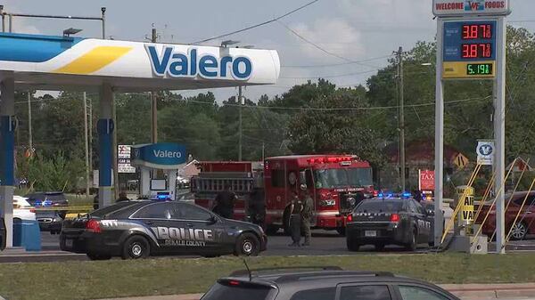 DeKalb County police are investigating a Thursday afternoon shooting at a gas station along Redan Road in Stone Mountain.