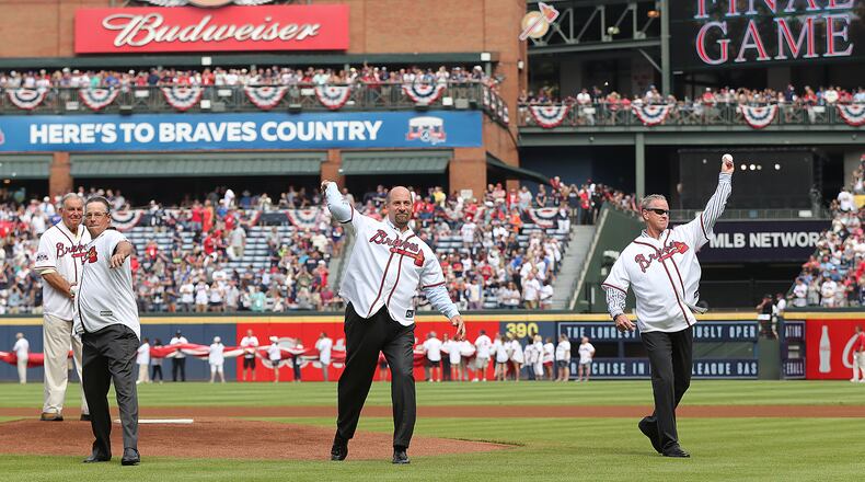 Former Braves Hall of Fame manager Bobby Cox looks on as his three former Hall of Fame pitchers Greg Maddux, John Smoltz, and Tom Glavine throw out the first pitch for the Braves in the final game at Turner Field last season. (Curtis Compton/ccompton@ajc.com)