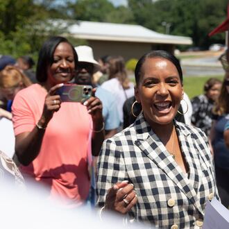 Democratic nominee for governor Keisha Lance Bottoms campaigns outside of a shuttered rural hospital in Commerce last month. (Riley Bunch/AJC)