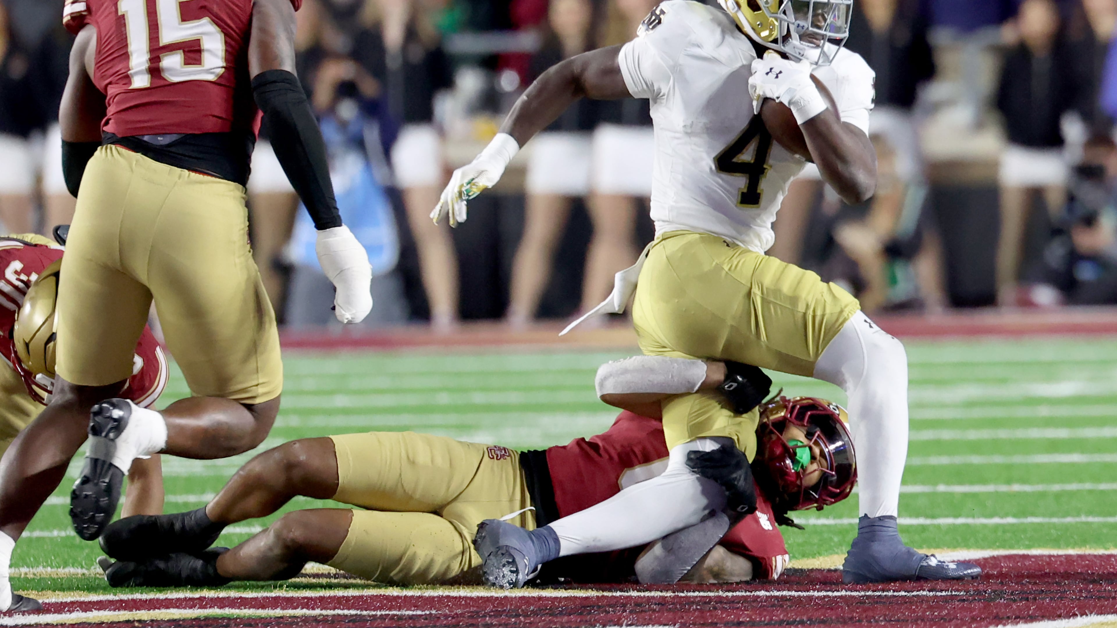 Notre Dame running back Jeremiyah Love (4) and the Irish figure to benefit most from top 10 teams Vanderbilt, Georgia Tech and Miami losing on Saturday. Notre Dame in the race for a spot in the 12-team College Football Playoff field. (AP Photo/Mark Stockwell)