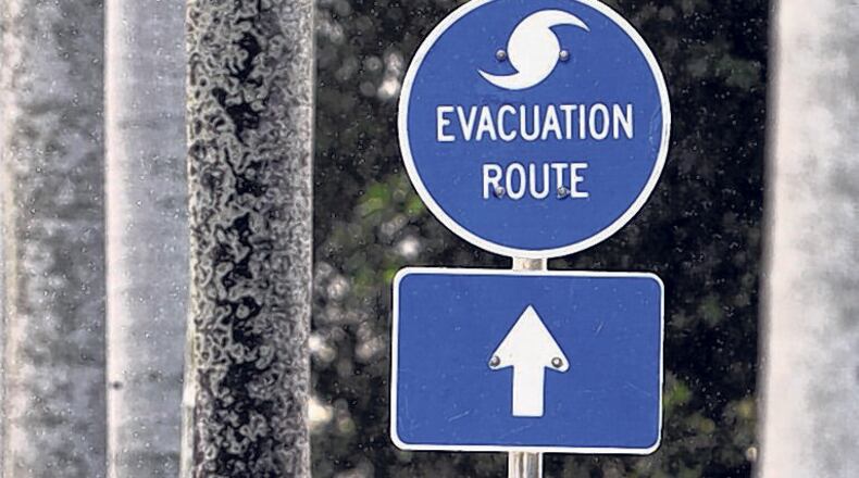 An evacuation route sign on Royal Palm Way in Palm Beach.