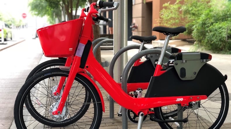 Uber's Jump Bikes are parked in downtown Austin on Thursday, June 28, 2018.
