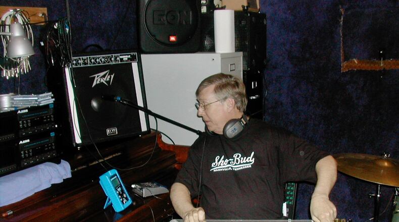 Wade Medlock’s voice opened many Atlantans’ days for years as a reporter and news manager for WGST Radio. Medlock also loved to play music from his youth through his retirement, including founding a country music jam session in 2004.Courtesy of the family