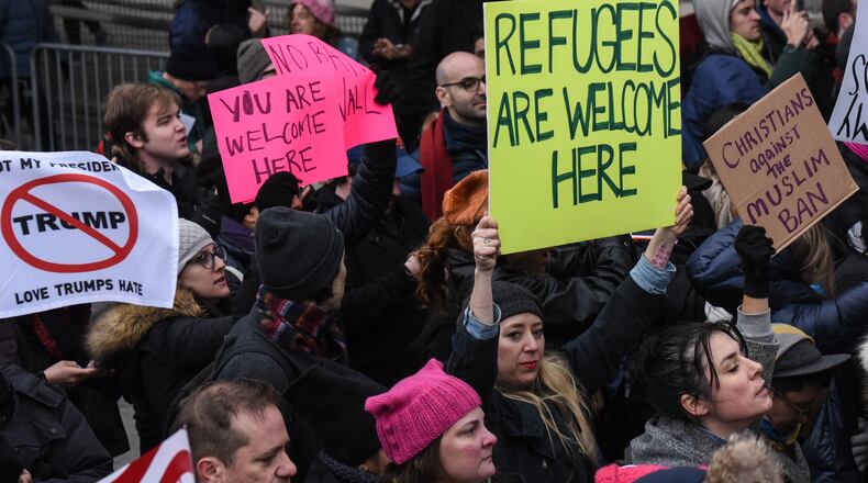 NEW YORK, NY - JANUARY 28: Protestors rally during a demonstration against the Muslim immigration ban at John F. Kennedy International Airport on January 28, 2017 in New York City. President Trump signed the controversial executive order that halted refugees and residents from predominantly Muslim countries from entering the United States. (Photo by Stephanie Keith/Getty Images)