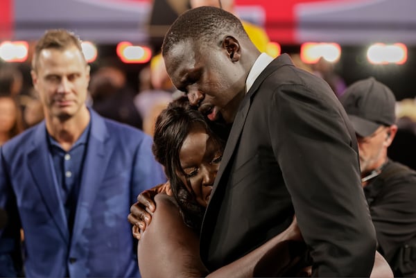 Khaman Maluach reacts after being selected 10th by the Houston Rockets in the first round of the NBA basketball draft, Wednesday, June 25, 2025, in New York. (AP Photo/Adam Hunger)