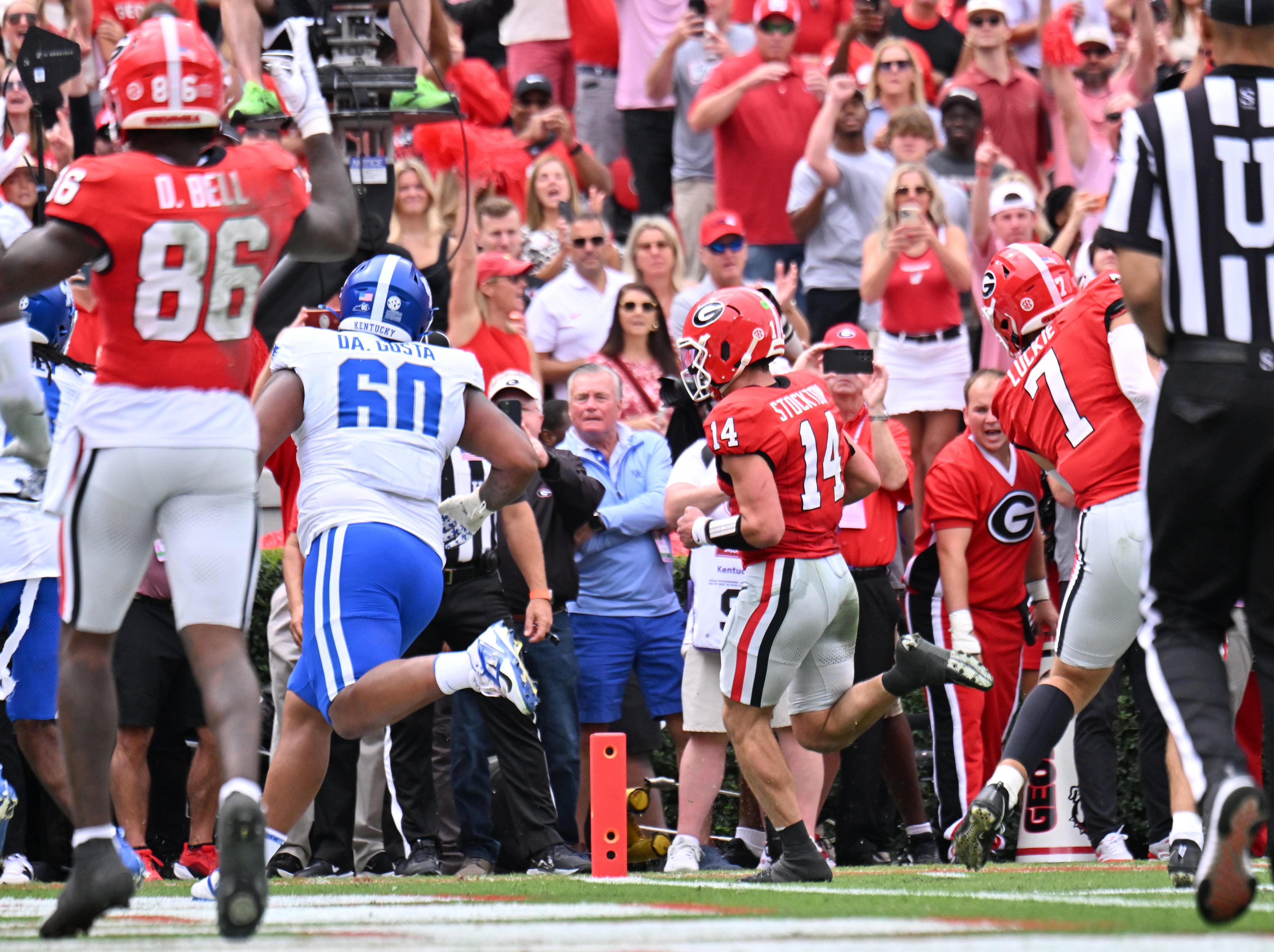 Georgia quarterback Gunner Stockton (14) runs for a touchdown during the first half in a NCAA college football game at Sanford Stadium, Saturday, October 4, 2025, in Athens. (Hyosub Shin / AJC)