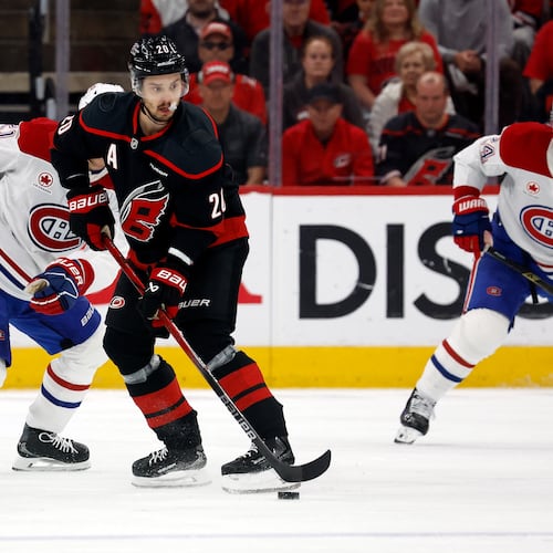 Carolina Hurricanes' Sebastian Aho (20) controls the puck against the Montreal Canadiens during the first period in Game 2 of the Eastern Conference finals NHL hockey Stanley Cup playoff series in Raleigh, N.C., Saturday, May 23, 2026. (AP Photo/Karl DeBlaker)