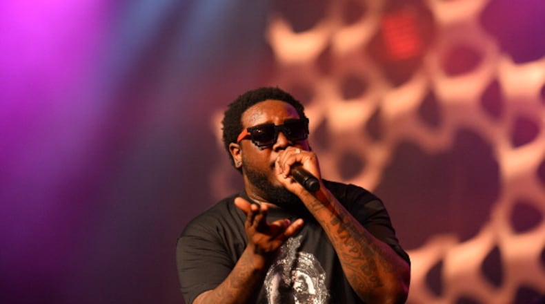 Rapper T-Pain and his bodyguard were questioned by Atlanta police in the Atlanta airport Friday after a gun was found at a TSA checkpoint, police said.