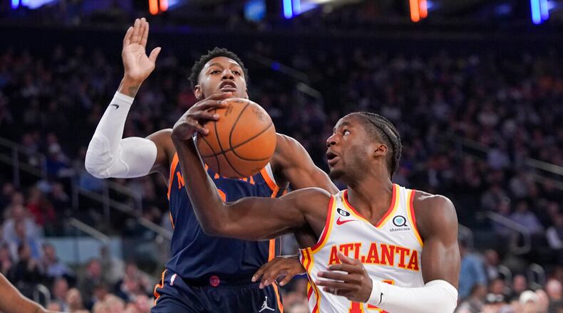 Hawks forward AJ Griffin (14) has had his moments with the team this season, including a pair of game-winning shots in overtime, and is averaging 10 points per game. (AP Photo/Mary Altaffer)