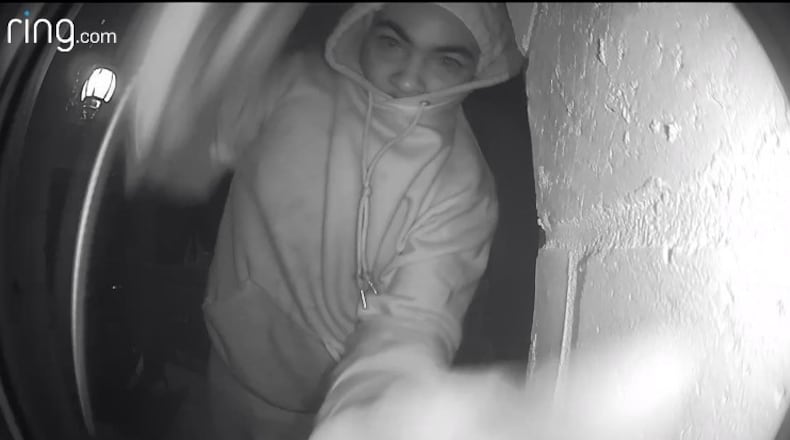 Surveillance video from a Ring camera captured this person taking the device off a home.