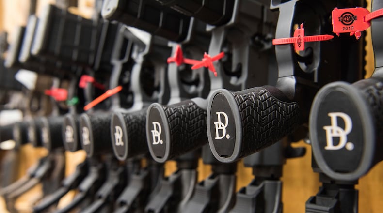 A row of AR-15 style rifles manufactured by Daniel Defense sit in a vault at the company's headquarters in Black Creek in Bryan County, Ga. (Lisa Marie Pane/AP 2017)