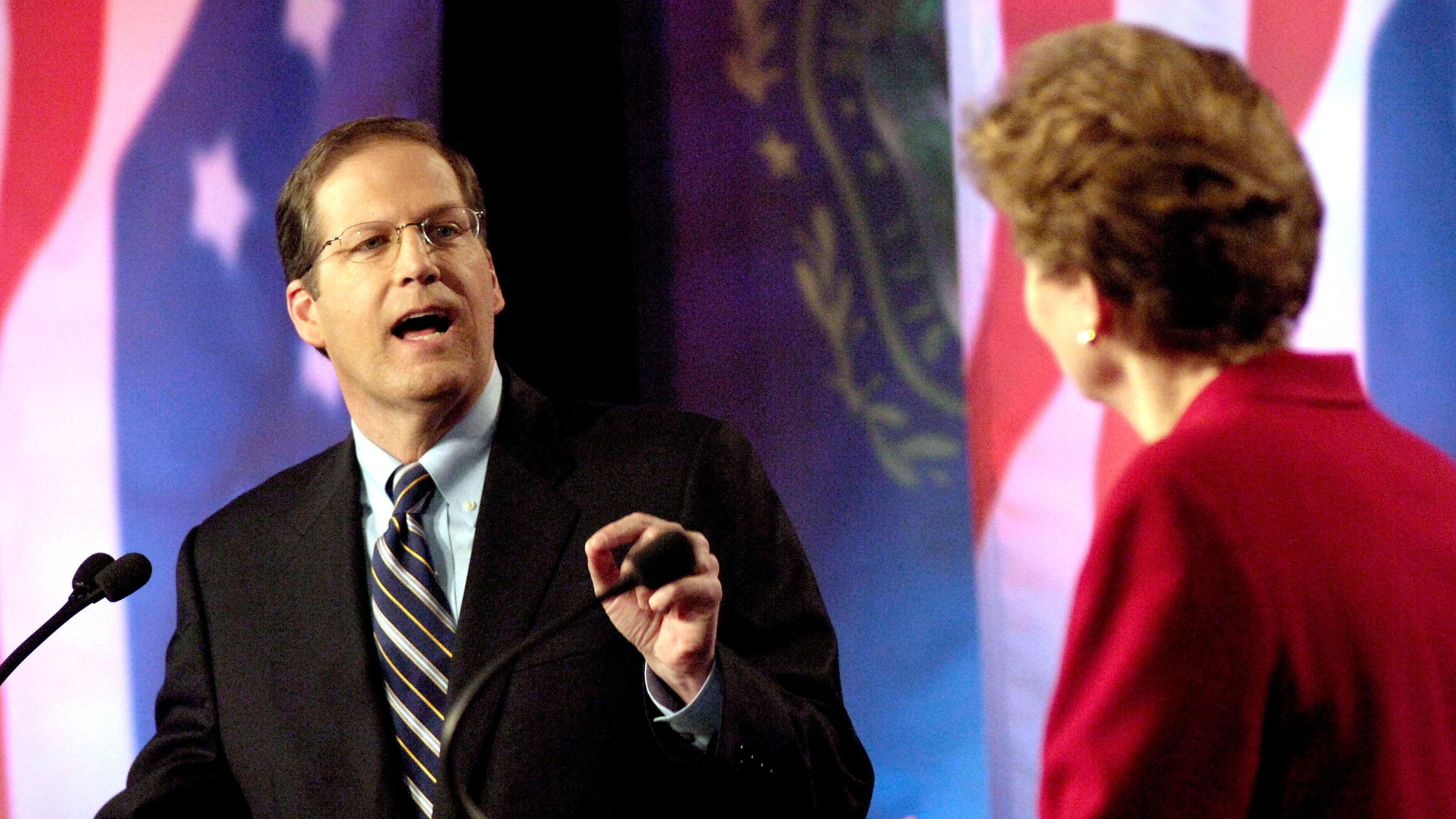 FILE - U.S. Sen. John Sununu, R-N.H., left, spars with Democratic rival and former governor Jeanne Shaheen during a live televised debate in Manchester, N.H., Oct. 30, 2008. (AP Photo/POOL/David Lane, File)