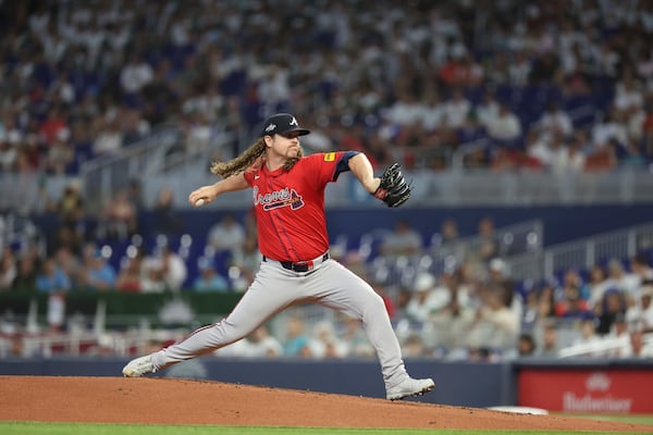 Atlanta Braves starting pitcher Grant Holmes throws during the first inning of a baseball game against the Miami Marlins, Saturday, June 21, 2025, in Miami. (AP Photo/Alexandra Rodriguez)