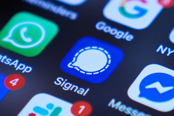 Signal app on a smartphone is seen on a mobile device screen Tuesday, March 25, 2025, in Chicago. (AP Photo/Kiichiro Sato)