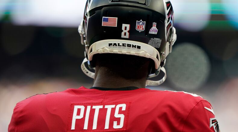 A close up, detail view of the Crucial Catch decal on the helmet of Falcons tight end Kyle Pitts (8) against the New York Jets Sunday, Oct. 10, 2021, at Tottenham Hotspur Stadium in London. (Steve Luciano/AP)