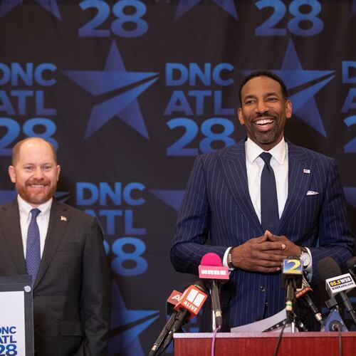 Atlanta Mayor Andre Dickens (center) and Democratic Party of Georgia Chair Charlie Bailey (left) make their case to Democratic National Committee Chair Ken Martin on Thursday, April 23, 2026, as to why the city should host the 2028 Democratic National Convention. (Riley Bunch/AJC)