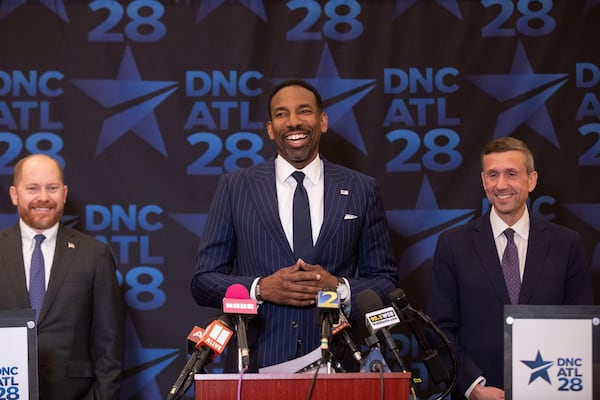 Atlanta Mayor Andre Dickens, center; Democratic Party of Georgia Chair Charlie Bailey, left, and Democratic National Committee Chair Ken Martin, right, seen here in April. (Riley Bunch/AJC)