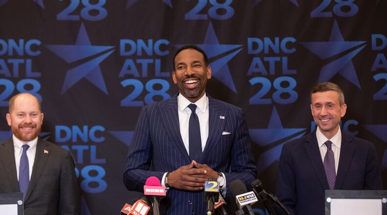 Atlanta Mayor Andre Dickens (center) and Democratic Party of Georgia Chair Charlie Bailey (left) make their case to Democratic National Committee Chair Ken Martin on Thursday, April 23, 2026, as to why the city should host the 2028 Democratic National Convention. (Riley Bunch/AJC)