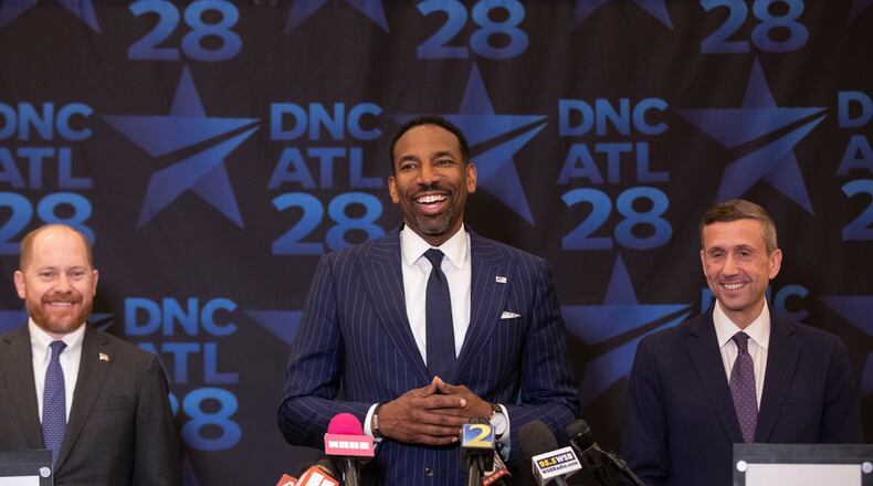 Atlanta Mayor Andre Dickens (center) and Democratic Party of Georgia Chair Charlie Bailey (left) make their case to Democratic National Committee Chair Ken Martin on Thursday, April 23, 2026, as to why the city should host the 2028 Democratic National Convention. (Riley Bunch/AJC)