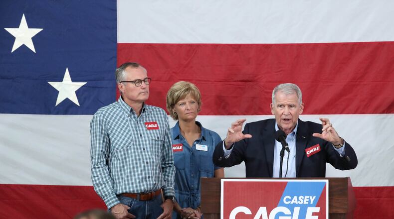 NRA President-elect Oliver North, right, speaks next to Lt. Gov. Casey Cagle and his wife Nita at the Governors Gun Club Saturday, July 14, 2018, in Kennesaw, Ga. (JASON GETZ/SPECIAL TO THE AJC)