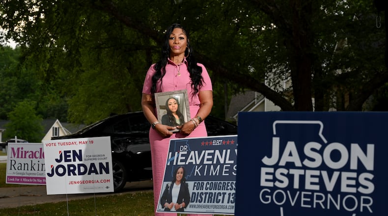 Shanette Williams, whose daughter Amber Nicole Thurman died after a delay in emergency medical care tied to Georgia’s abortion ban, poses for a portrait at her home on Wednesday, April 29, 2026, in Covington. Williams has become involved in political advocacy and is supporting campaigns this cycle. (Hyosub Shin/AJC)