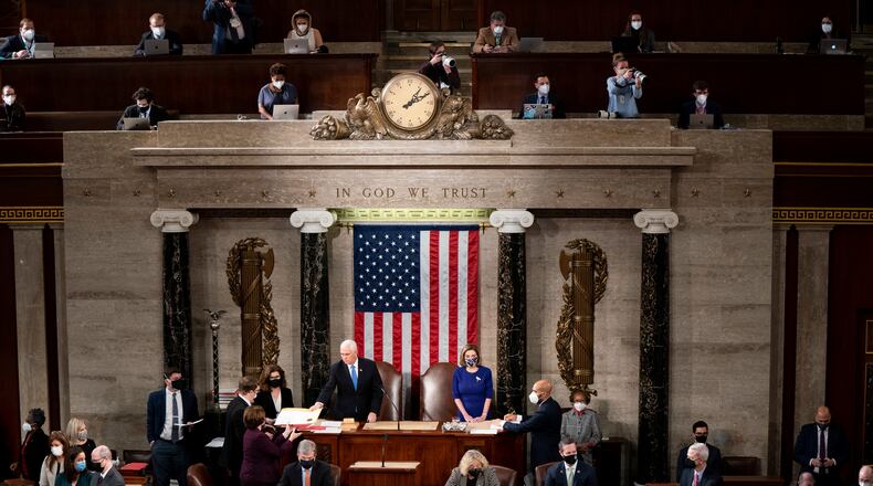 Vice President Mike Pence and House Speaker Nancy Pelosi preside over a joint session of Congress to certify the 2020 Electoral College results at the Capitol in Washington, Jan. 6, 2021.  (Erin Schaff/The New York Times)