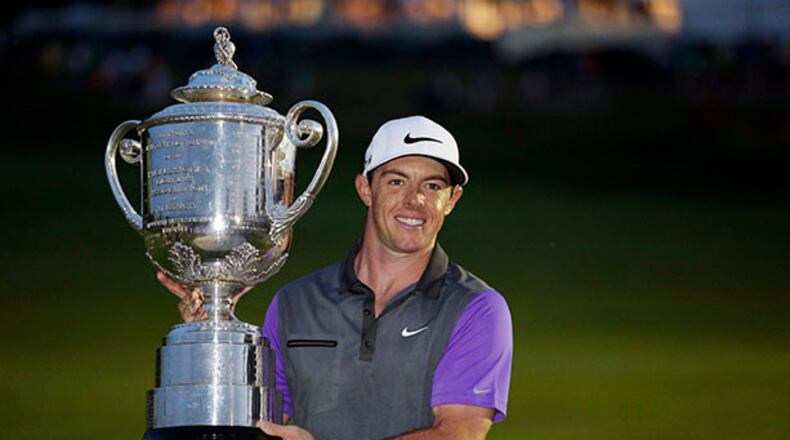 Rory McIlroy, of Northern Ireland, celebrates after winning the PGA Championship golf tournament at Valhalla Golf Club on Sunday, Aug. 10, 2014, in Louisville, Ky. (AP Photo/Mike Groll)