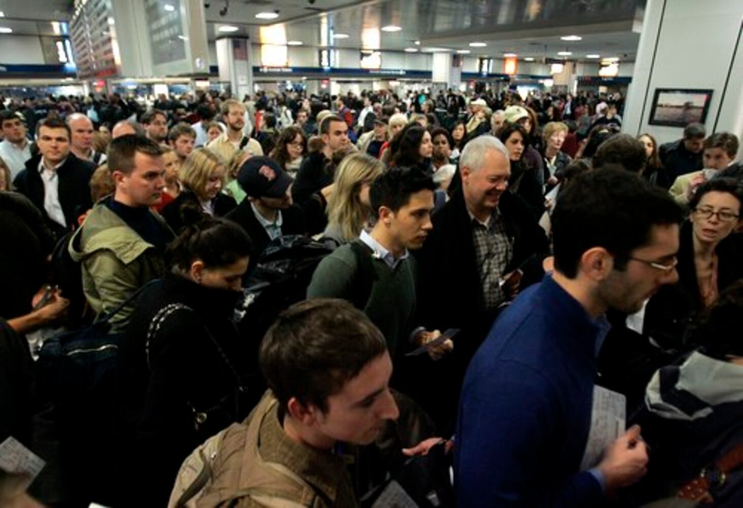 It's busy everywhere: Scenes from the nation's airports