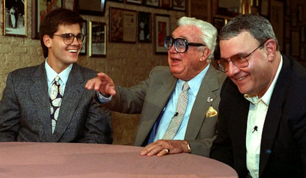 This 1991 file photo legendary Cubs announcer Harry Caray (center) surrounded by his son Skip (right) and grandson Chip. The younger Carays were both longtime Braves broadcasters.