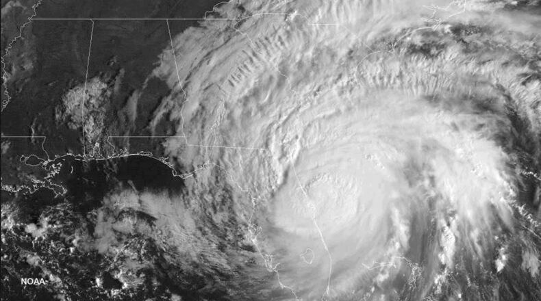 FILE: This image taken on Oct. 7, 2016, shows Hurricane Matthew over the Southeastern part of the U.S. (NOAA via AP)