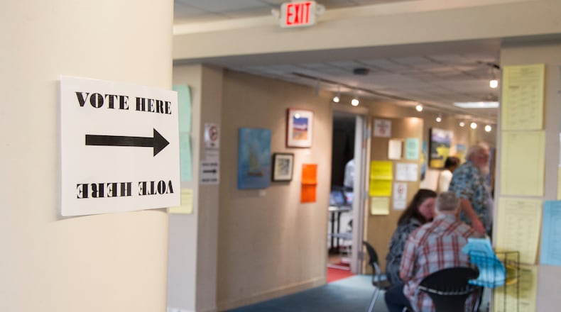 People take part in Saturday early voting at the Dunwoody Public Library in Dunwoody, Georgia, on Saturday, May 12, 2018. (REANN HUBER/REANN.HUBER@AJC.COM)