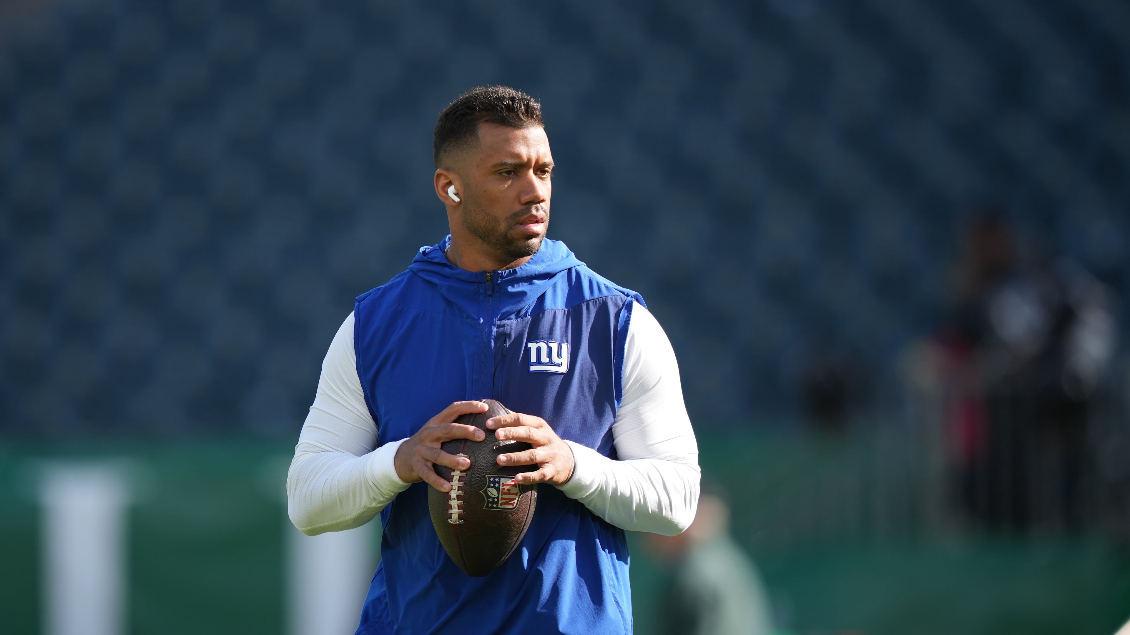 FILE - New York Giants' Russell Wilson warms up before an NFL football game against the Philadelphia Eagles, Oct. 26, 2025, in Philadelphia. (AP Photo/Matt Slocum, File)