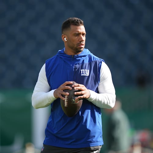 FILE - New York Giants' Russell Wilson warms up before an NFL football game against the Philadelphia Eagles, Oct. 26, 2025, in Philadelphia. (AP Photo/Matt Slocum, File)