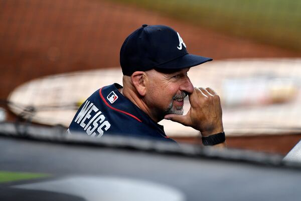 Braves manager Walt Weiss was all grins in Miami. (Michael Laughlin/AP)