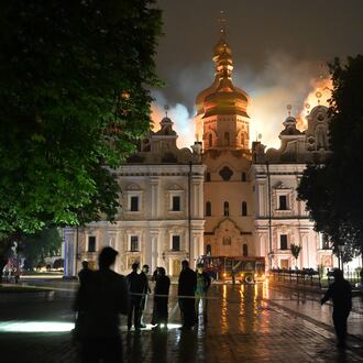 The roof of the Dormition Cathedral of the Kyiv-Pechersk Lavra burns, Monday, June 15, 2026. (AP Photo/Danylo Antoniuk)