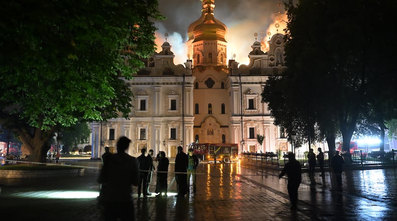 The roof of the Dormition Cathedral of the Kyiv-Pechersk Lavra burns, Monday, June 15, 2026. (AP Photo/Danylo Antoniuk)