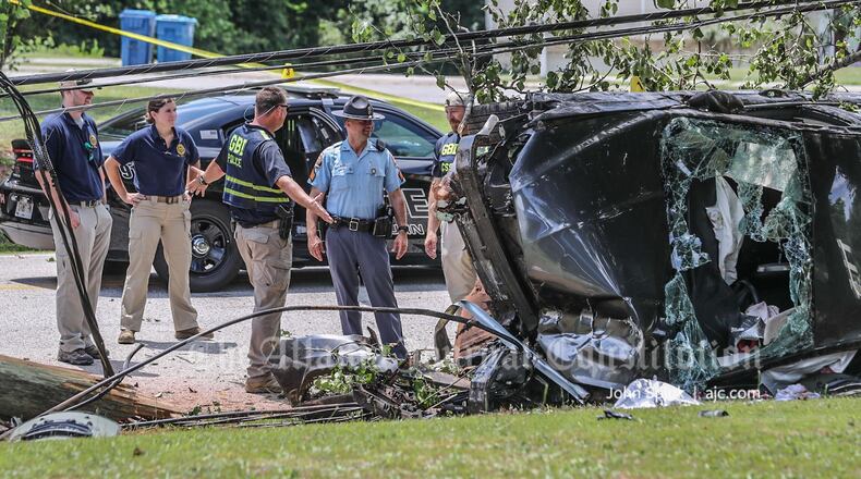 The chase ended when the driver crashed into a power pole near Browns Bridge Road and Bradford Lane Park in Auburn, according to the GBI.