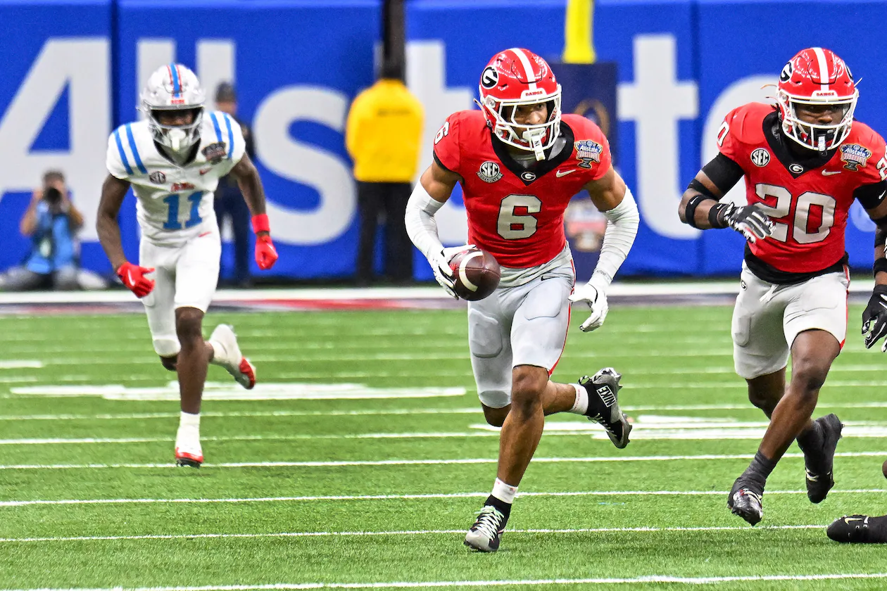 Georgia Bulldogs defensive back Daylen Everette (6) recovers a fumble from Ole Miss for a 47-yard touchdown run during the second quarter of the NCAA College Football Playoff quarterfinal game at the Sugar Bowl in the Caesars Superdome, Thursday, Jan. 1, 2026, in New Orleans. (Hyosub Shin/AJC)