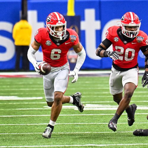 Georgia Bulldogs defensive back Daylen Everette (6) recovers a fumble from Ole Miss for a 47-yard touchdown run during the second quarter of the NCAA College Football Playoff quarterfinal game at the Sugar Bowl in the Caesars Superdome, Thursday, Jan. 1, 2026, in New Orleans. (Hyosub Shin/AJC)