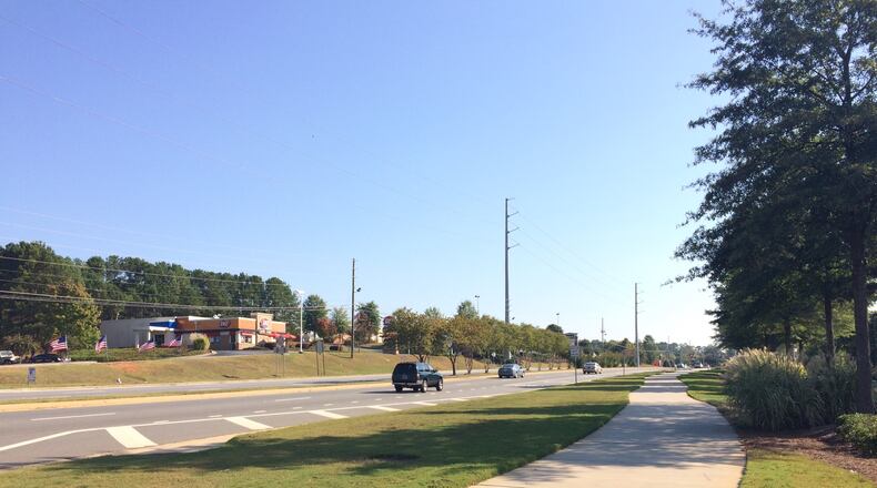 Sidewalk near the intersection of Dallas Highway and Casteel Road in Cobb County. (BECCA GODWIN / BECCA.GODWIN@AJC.COM)