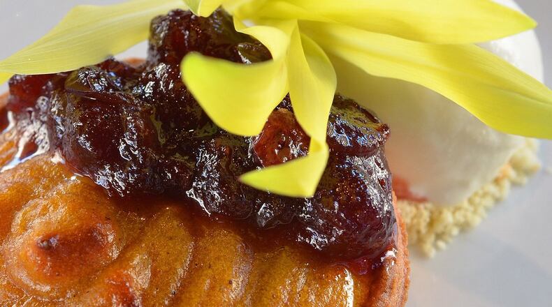 The warm butternut squash tart is served with Dark & Stormy ice cream, cranberry compote, sugar cookie crumbles and a corn sprout garnish at the Shed at Glenwood. (Chris Hunt / Special)