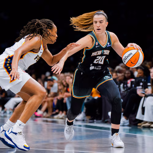 New York Liberty guard Sabrina Ionescu (20) dribbles toward the basket during the first half of a WNBA basketball game against the Indiana Fever, Saturday, Aug. 22, 2026, in New York. (AP Photo/Angelina Katsanis)