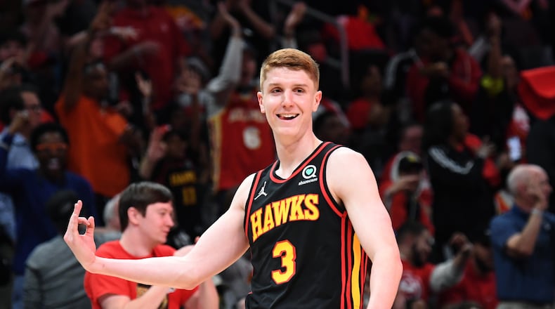 Hawks guard Kevin Huerter celebrates after scoring a 3-point basket during the second half in an NBA play-in tournament game against the Hornets on Wednesday night at State Farm Arena. The Hawks won 132-103. (Hyosub Shin / Hyosub.Shin@ajc.com)